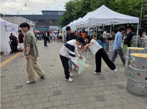 경상원, 오산 오색시장 야맥축제 연계 ESG 캠페인 펼쳐…플로깅, 장바구니 배부 등